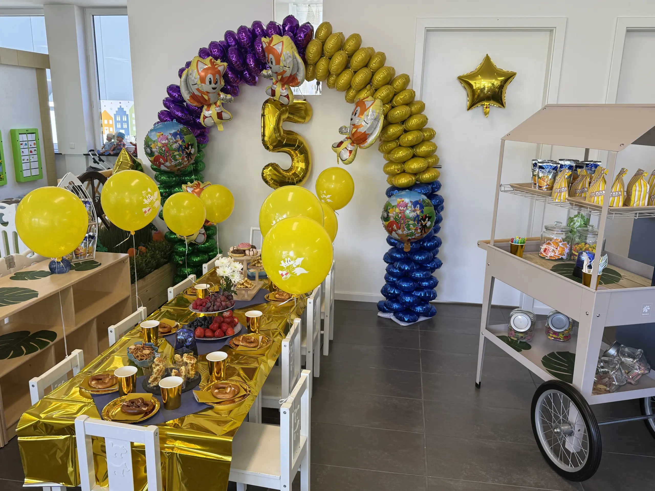 A carefully decorated candy bar for a children's birthday party at BAAM Kids Village